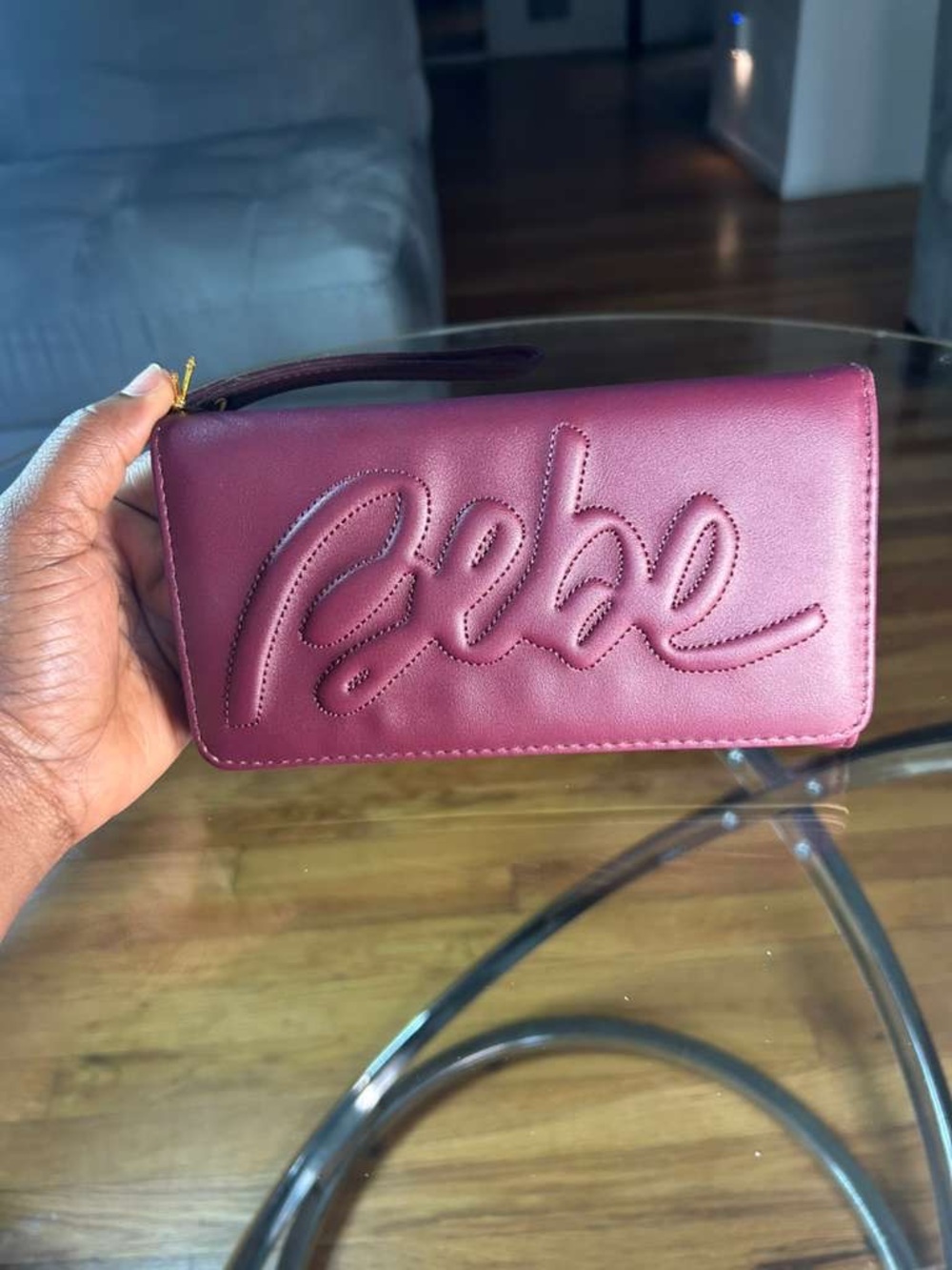 bebe Quilted Script Wristlet in Burgundy